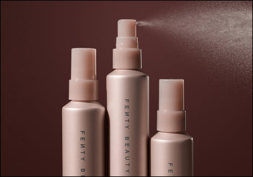 3 You Mist Makeup-Extending Setting Spray bottles with one showing fine mist. 3 You Mist Makeup-Extending Setting Spray bottles with one showing fine mist.